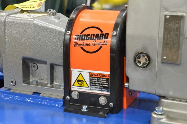 Close view of an installed orange Uniguard CGU Kit guard