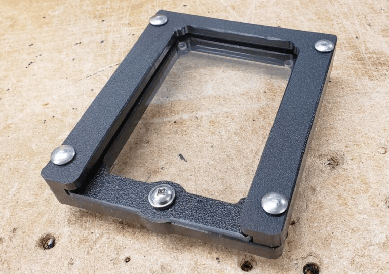 Uniguard flat inspection window with a black frame